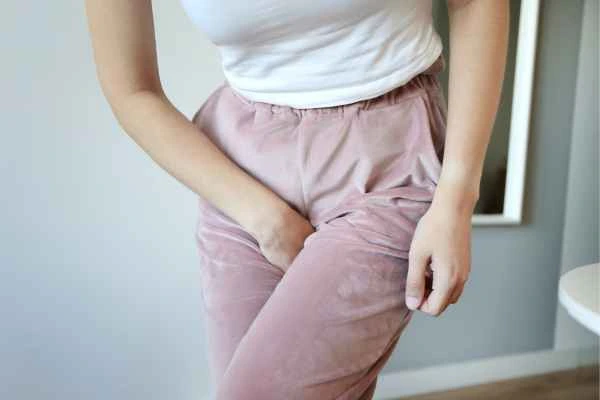 woman running for the toilet because of urinary incontinence Keighley